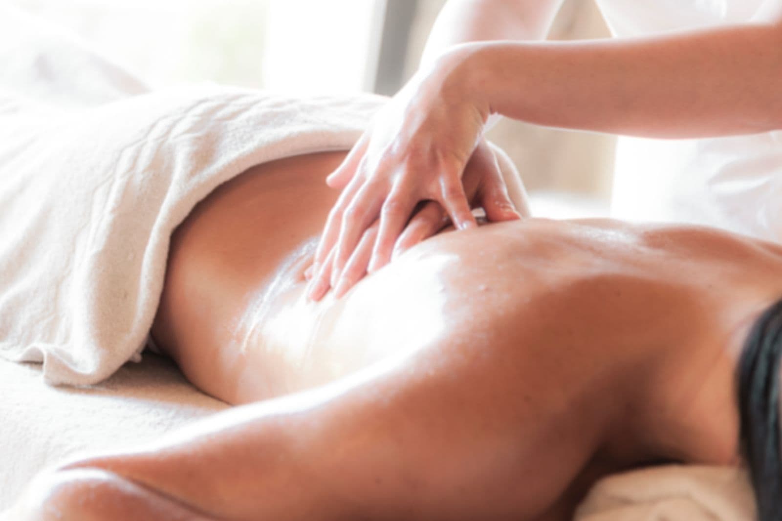 A relaxing back massage in a spa setting